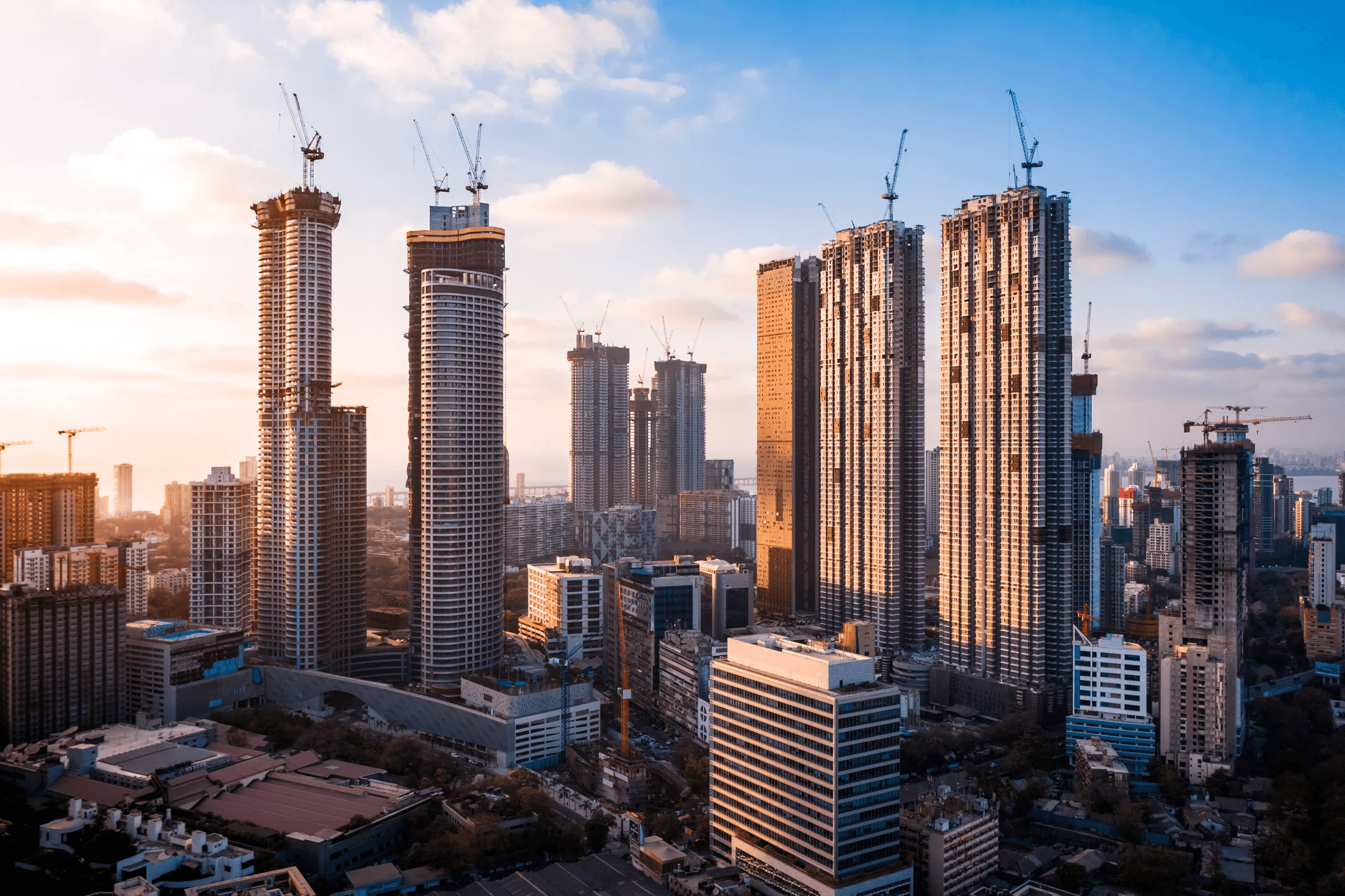 Urban skyline with high-rise buildings under construction