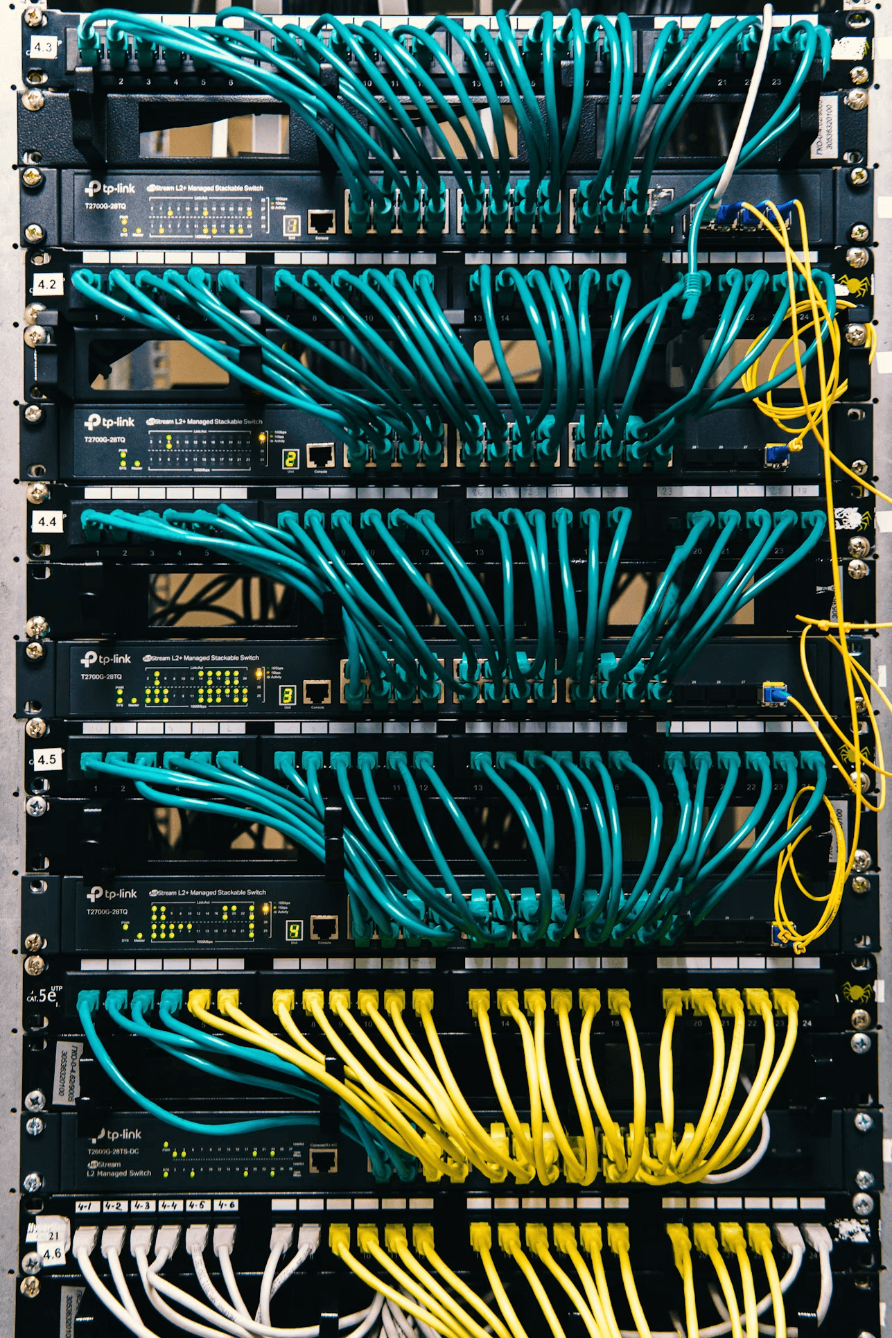 Network switch rack with dense connectivity cabling